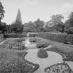 View of garden with Cupid figure at Carberry Tower.