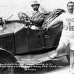 View of two men and a vintage car. One man is wearing a jumper with the motto "Trained on Veda Bread".
Inscr: "Mr R. Graham (patentee of Veda Bread) and C.W. Hart (World's champion long distance runner) on the Brighton to London (double journey) 208 miles, run. 28.6.1914."