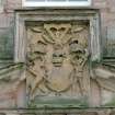 Courtyard, detail of carved panel in pediment above doorway in centre of south wall, Drumlanrig Castle