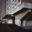 Dundee, Ardler Estate, Birkdale Place (Phase I): Ground floor view of entrances to Ardler Estate multi-storey block, showing concrete stanchions.