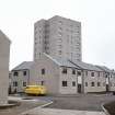 Aberdeen, Jasmine Place, St Clement's Court: View of 11-storey block with new housing in the foreground.