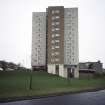 Aberdeen, Marchburn Drive, Granitehill House: View from road of a 10-storey block. Housing and low-rise development are visible in the background.