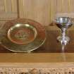 Interior.
Detail of communion plate; brass alms dish and silver baptistry bowl.