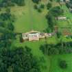 Oblique aerial view centred on the country house with walled garden adjacent, taken from the SW.