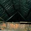 Interior-detail of roof interior of blackhouse, showing apex of cruck couple