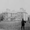 View from South of Dryden House, Midlothian, with man standing in foreground.