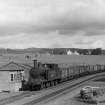View fuel (rail) wagons at weigh-bridge showing LNER tank locomotive no.1169 at the N end of the site.