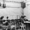 Women working in the P.A.D, control room of the Bishopton Royal Ordnance Factory, Renfrewshire.
