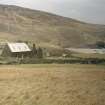 View of school house and adjacent roofless school room