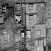Edinburgh, 82, Canongate, Nisbet of Dirleton's House.
View of the back of the house, four storeys with many additions in a variety of bulding materials.