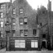Edinburgh, 82, Canongate, Nisbet of Dirleton's House.
View of the front of the house, four storeys high. The ground level being used as a doctor's surgery and waiting room.