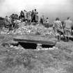 View of Nether Largie South chambered cairn with members of the Prehistoric Society Conference in 1954.