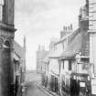 View looking down street, Paisley
Titled: 'St Mirin's Wynd'
Inscribed on verso; 'Up till 1880 or so Causeyside could not be reached directly by St Mirins St (Wynd), you had to go down to Cart Walk and then up Water Brae.  Earlier still the St Mirin Burn had to be crossed where street now is.'