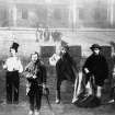 A photomontage of Paisley workers.
Titled: 'Daunie Weir, the Guck, Willie McAllister, Jock the Rat, Hungry Jamie, Willie Love,' (Figures in foreground L-R.)
Inscribed on verso: 'This is a valuable archive. All these old Paisley workers were in town about 1880 or so.  Wee Willie McAllister was called the "Charleston Puddock", he was a chimney sweep who fell 40ft and was a cripple.  His tongue was as dirty as his trade.  He was found dead in a close in Love St.' 
(More details and individual photographs in D. Rowand's" Pictorial History of Paisley" with acknowledgement to Paisley Museum.) 
