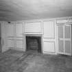 Interior.
Ground floor, rear wing, E appartment, detail of panelling and fireplace.