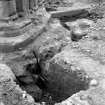 Interior.
View of excavation at base of pier.