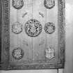 Detail of Beaton Panel studded with 7 carved bosses.