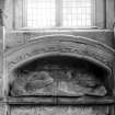 Interior.
Detail of funerary monument in wall under NE window.