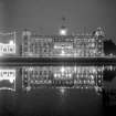 The 'new' Bengal Club, Kolkata lit for British royal visit; seen from across the General's Tank on the Maidan.  This part of the club is now demolished, having been completed in 1908 by the architect J Vincent Esch (who was also supervising architect for the Victoria Memorial, Kolkata).