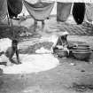 Washermen at a dhobi ghat.