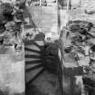 View of circular stairway during repairs of 1912