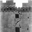 Detail of old tower wall and battlements.