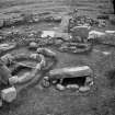 View of Cist A with capstone still in situ and Cist B with capstone removed at excavation of Cairnpapple henge and cairn, by Professor S Piggott.