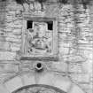 Coat of arms in North curtain wall above entrance to inner court