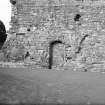 Segmental Archway, blocked up, springs and evidence of wooden roof?