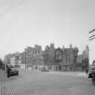 View of 11-15 Canongate, Robertson's Court and West along Canongate, Edinburgh in 1965.