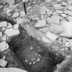 Excavation Photograph: Detail of stone setting on sand.