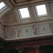 View of the frieze in the Hall, showing portrait profiles of Thomas Sydenham and Galen, a front-facing portrait of Hippocrates and a portrait profile of Avicenna; with representations of Hygeia, and two panels carved with a cherub.