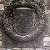 View of carved badge of the Army, at S end of E wall.