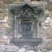 View of carved sign of the 15th Scottish Division (to W of niche containing statue representing Truth), N wall.