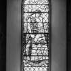 Interior.
View of stained glass war memorial window.