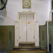 Interior.  Basement, lecture theatre door, view from E