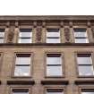 View of carved margents, between fourth floor windows, 5 St Andrew square.