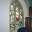 Interior.
View of stained glass window in S wall behind pulpit.