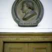 View of medallion portrait bust of Sir Walter Scott, above entrance to Court No.1.