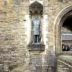 View of statue of Robert the Bruce, in niche on S side of entrance to Castle.