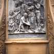 View of panel showing 'Hallowe'en', on the left side of the pedestal of the Robert Burns statue.