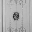 Edinburgh, Frogston Road East, Mortonhall House, interior.
View of a painted panel on a dummy door in the first floor principal drawing room. The panel depicts two lovers in a vignette with gilt scrolling leaves around the design.