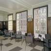 Interior. 1st floor, bar, view from W showing stained glass windows