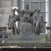 View of sculpture group representing 'Caledonia with her Children', on pierced parapet above S doorway to 3 George IV Bridge.