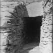 Passage between inner face of broch outer wall and south wheel shaped chamber.