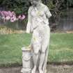 View of sculpture of a female figure, in garden of Dalmeny House.