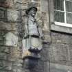 View of half-length sculpture of a Moor, on facade of Morocco Land, Canongate.