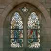 Interior.  View of stained glass window in north wall 'And Enoch walked with God'