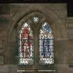 Interior.  View of stained glass window in south wall 'Blessed art thou among women'