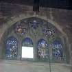 Interior.  View of stained glass window in north wall of chancel